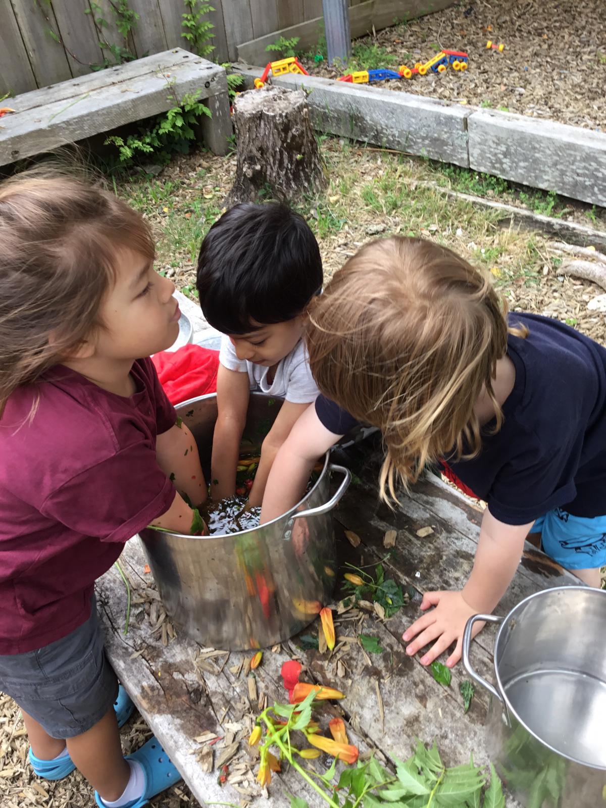 Children learning and playing at Little Village Preschool